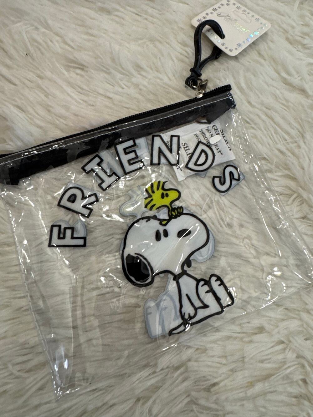 Snoopy clear zip pouch keychain with Snoopy and Woodstock graphic friends text